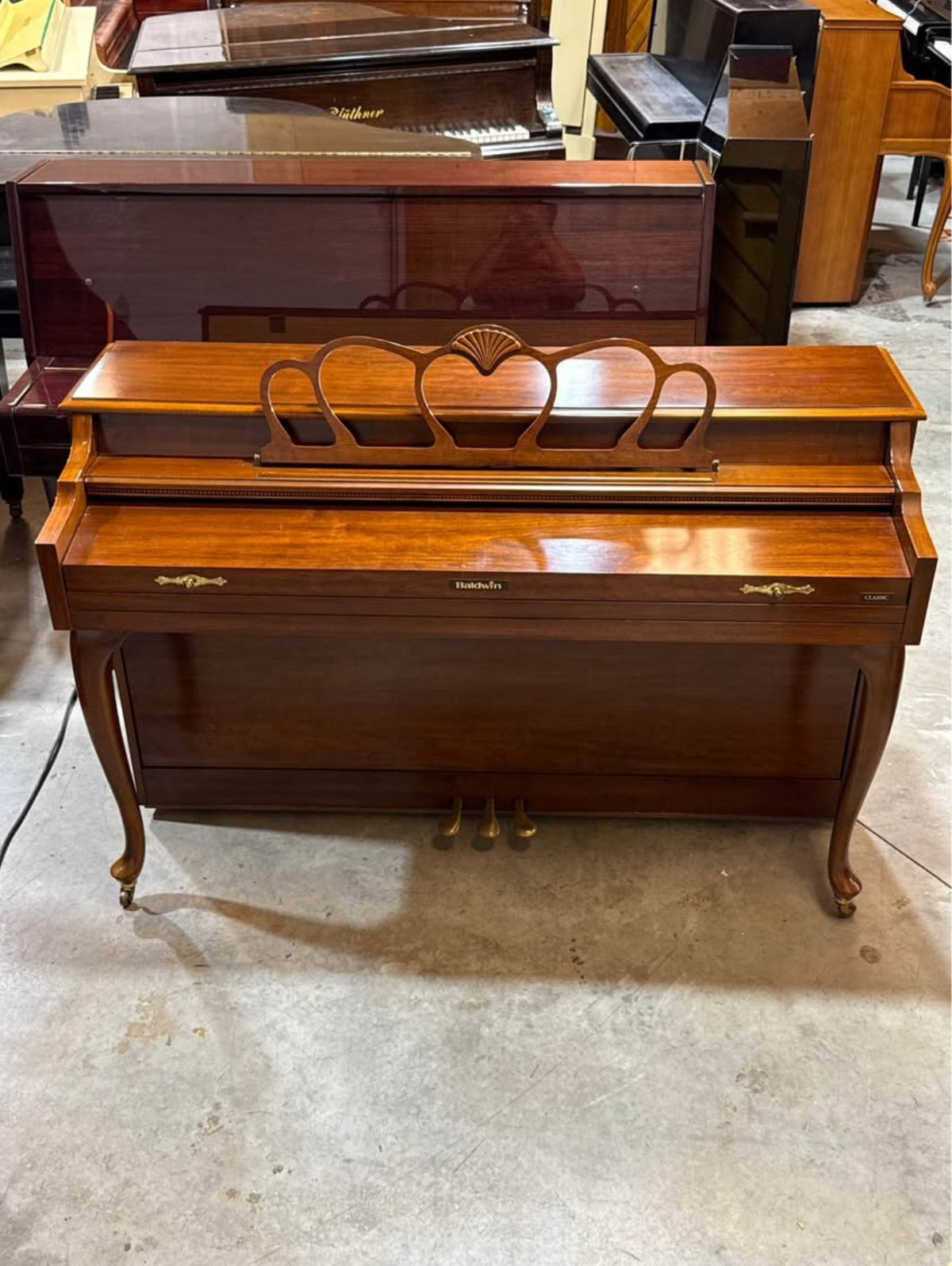 Baldwin Classic console piano closed, front view