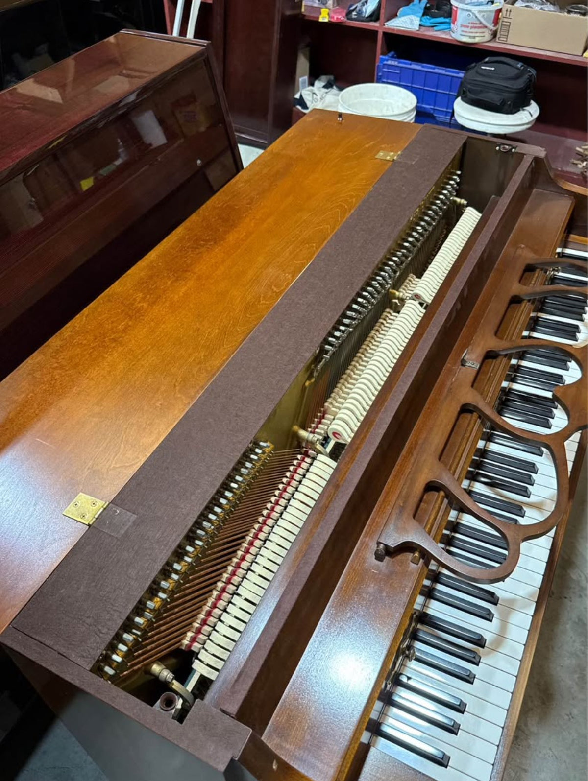 Inside the Baldwin console piano, hammers and strings