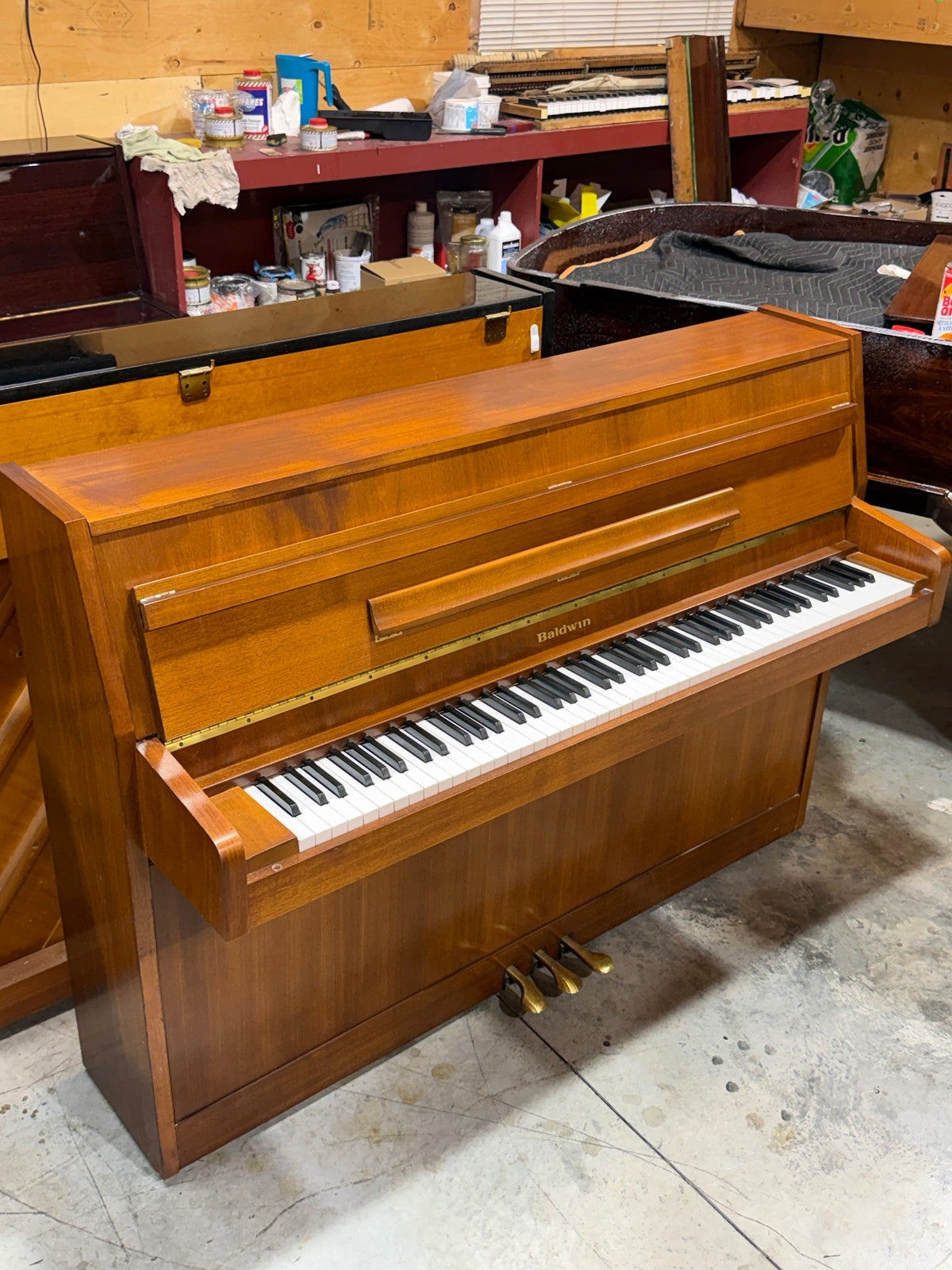 Baldwin compact upright piano side view
