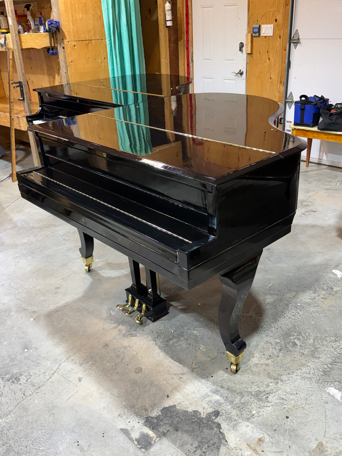 Cunningham grand piano with lid closed