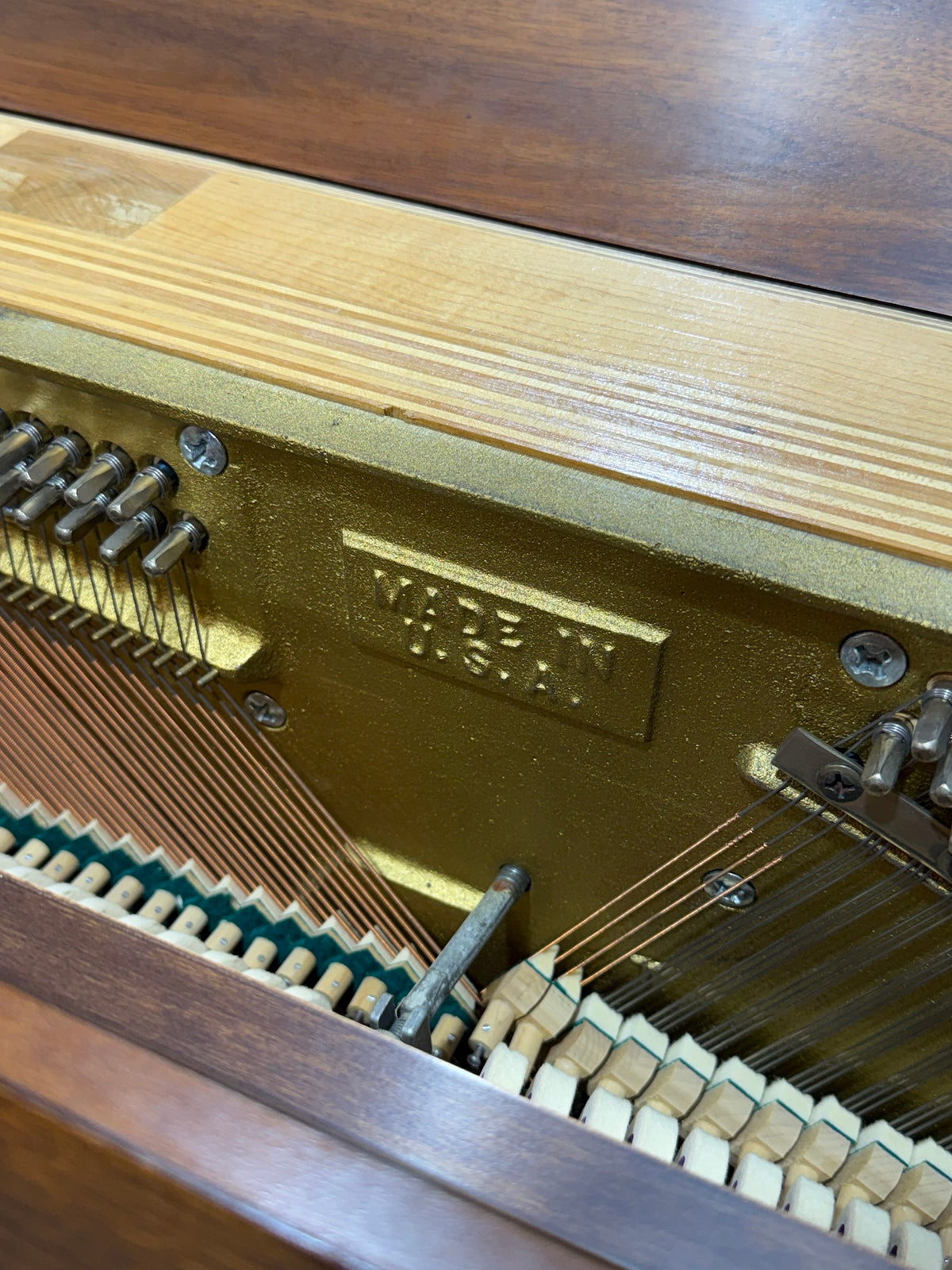 Made in USA marking on the Currier piano plate