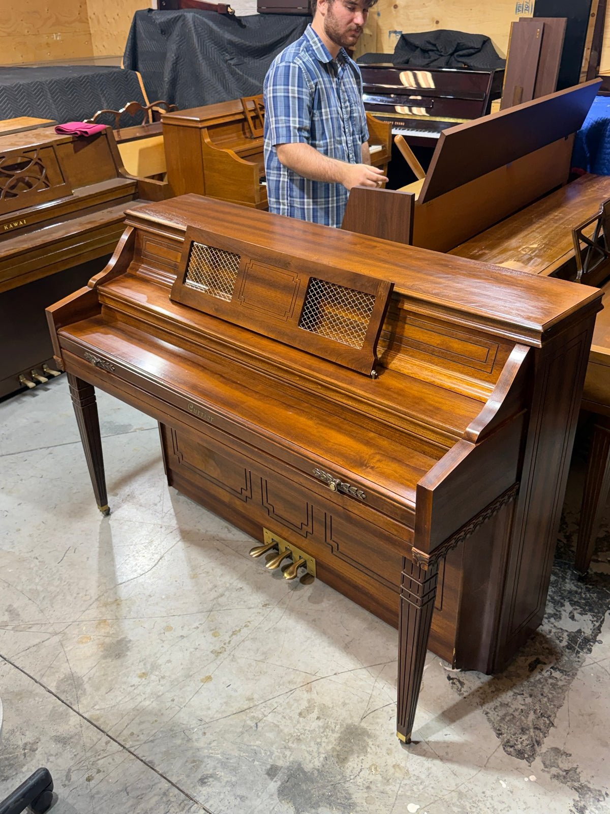 Used Currier console piano walnut with fallboard closed