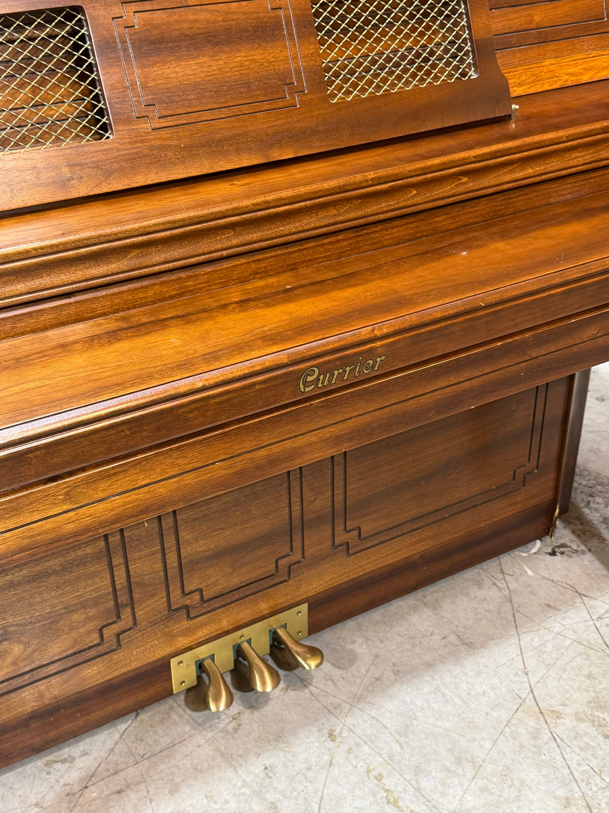 Currier nameboard and brass pedals