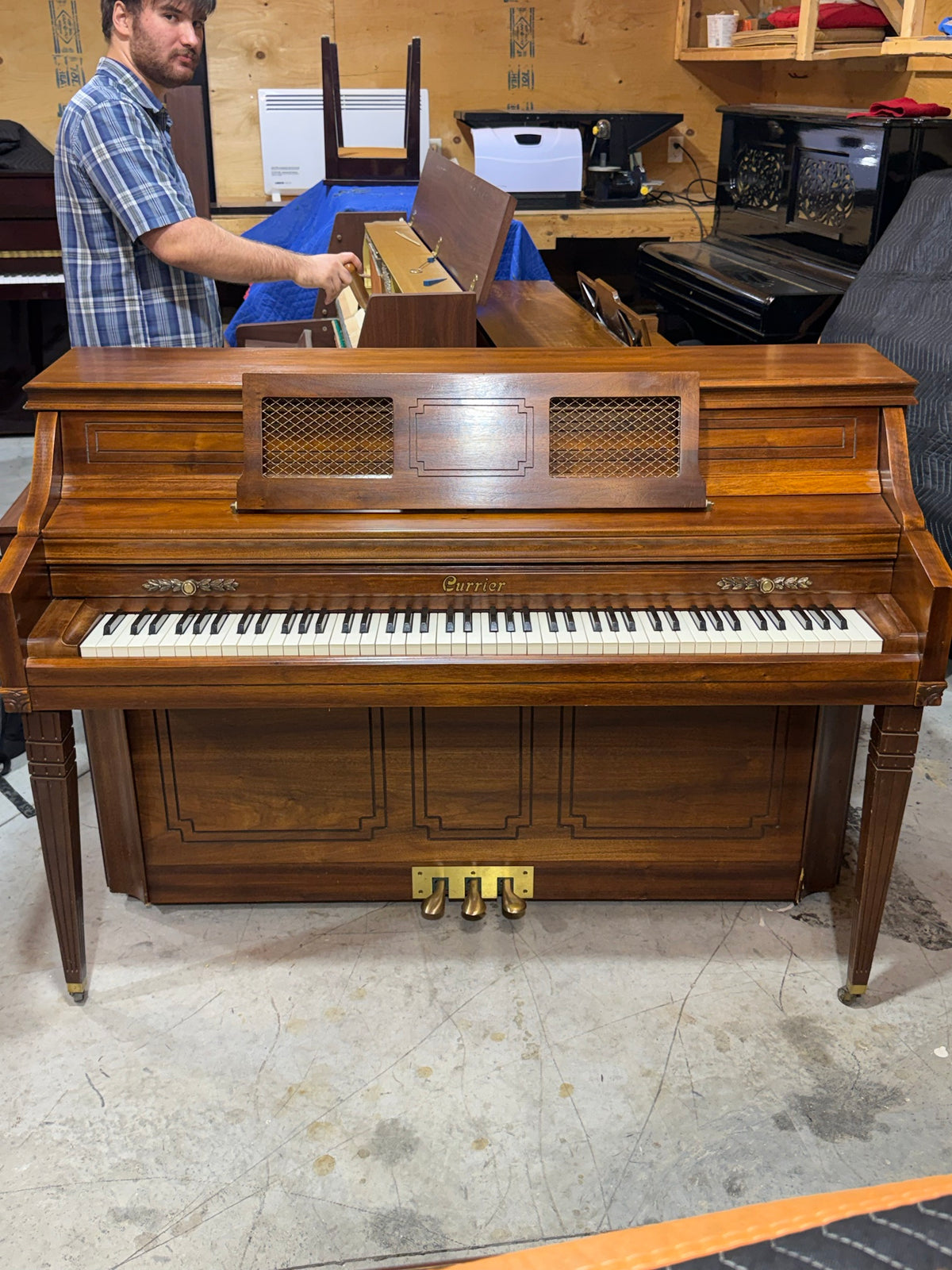 Front view of the Currier console piano