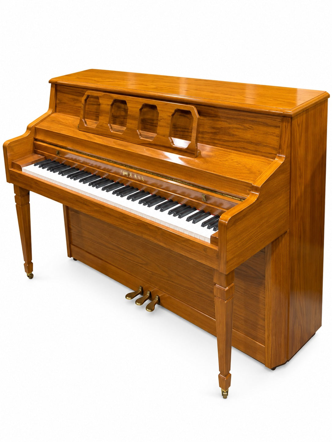 Kimball console piano in oak finish