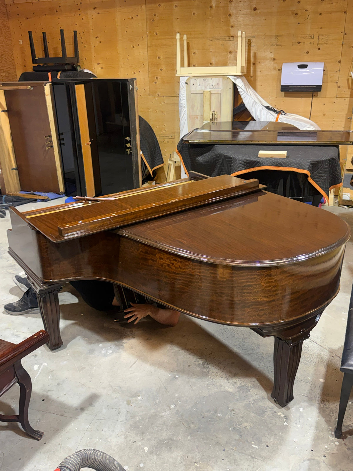 Mason & Risch grand piano being prepared in the workshop