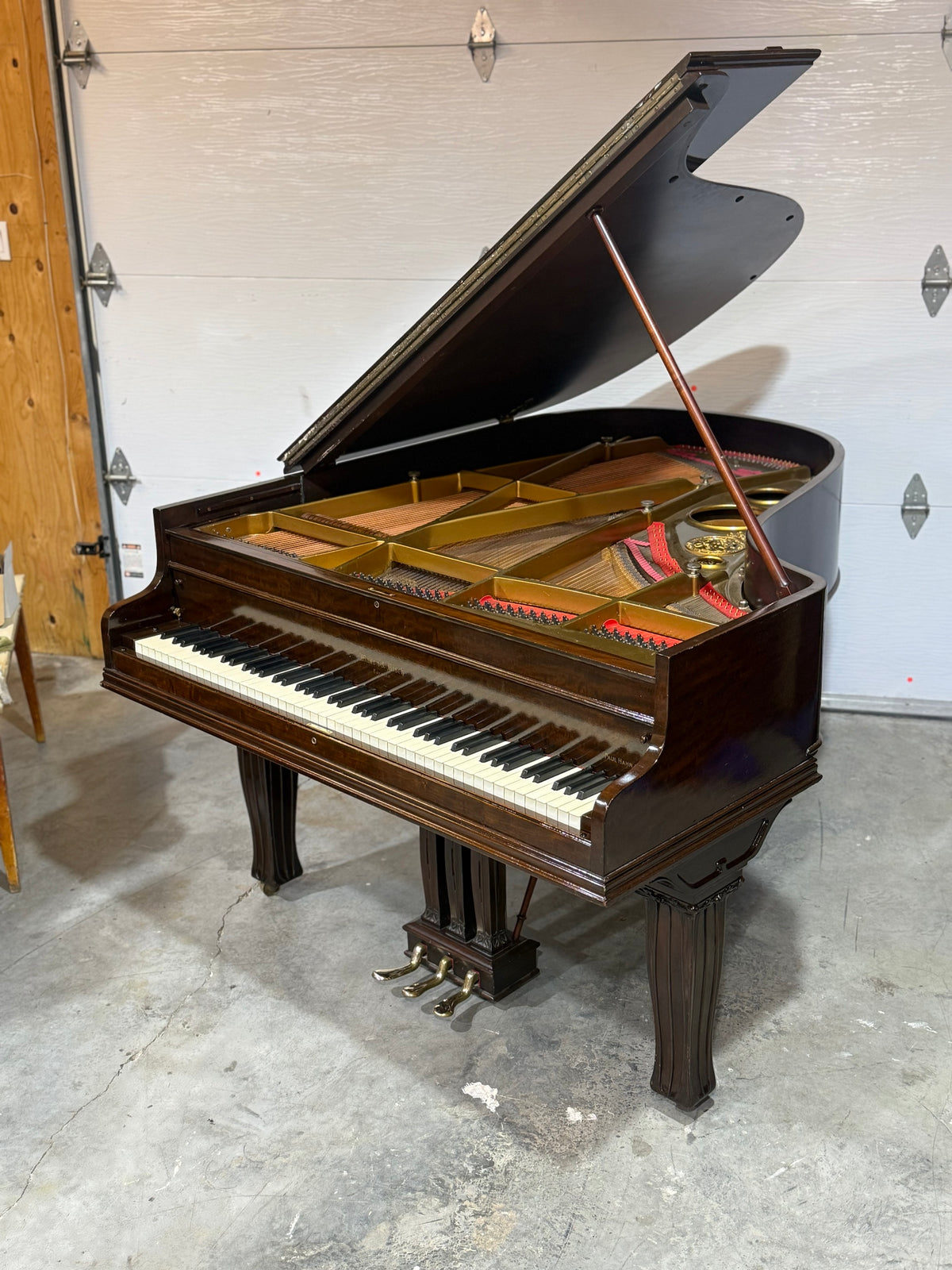 Mason & Risch grand piano with lid open, side view