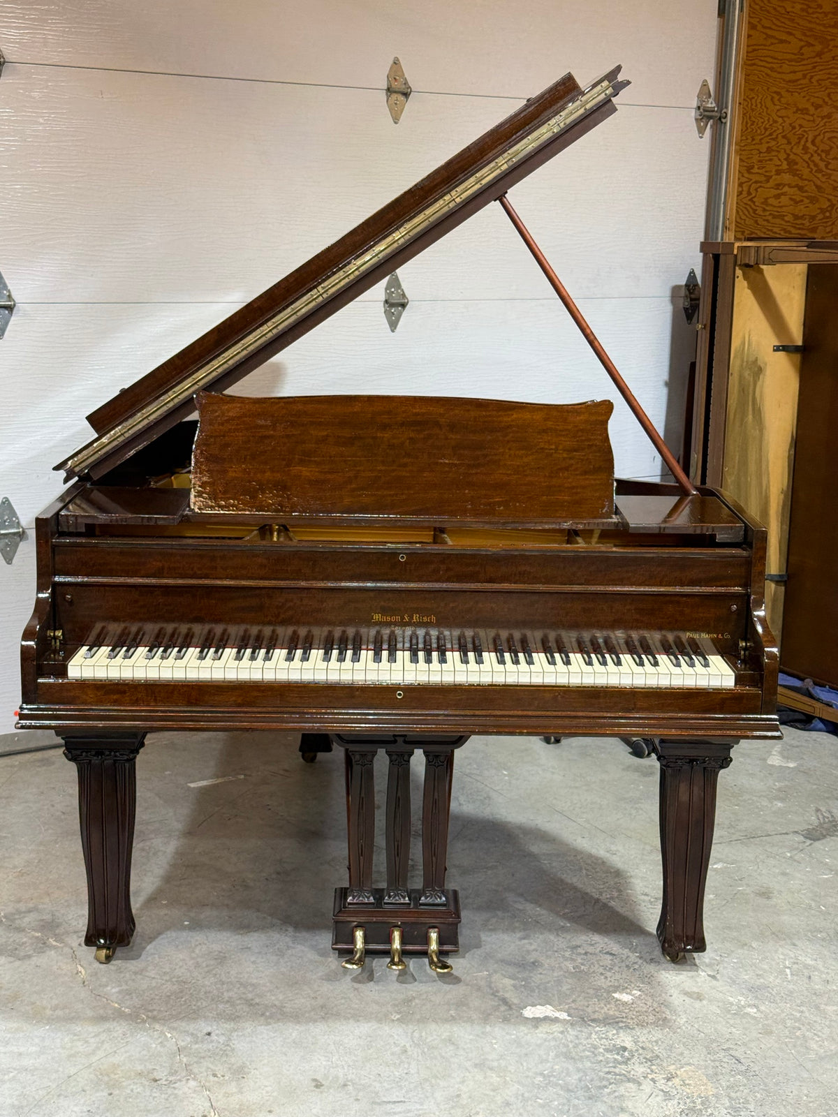 Front view of the Mason & Risch Toronto grand piano