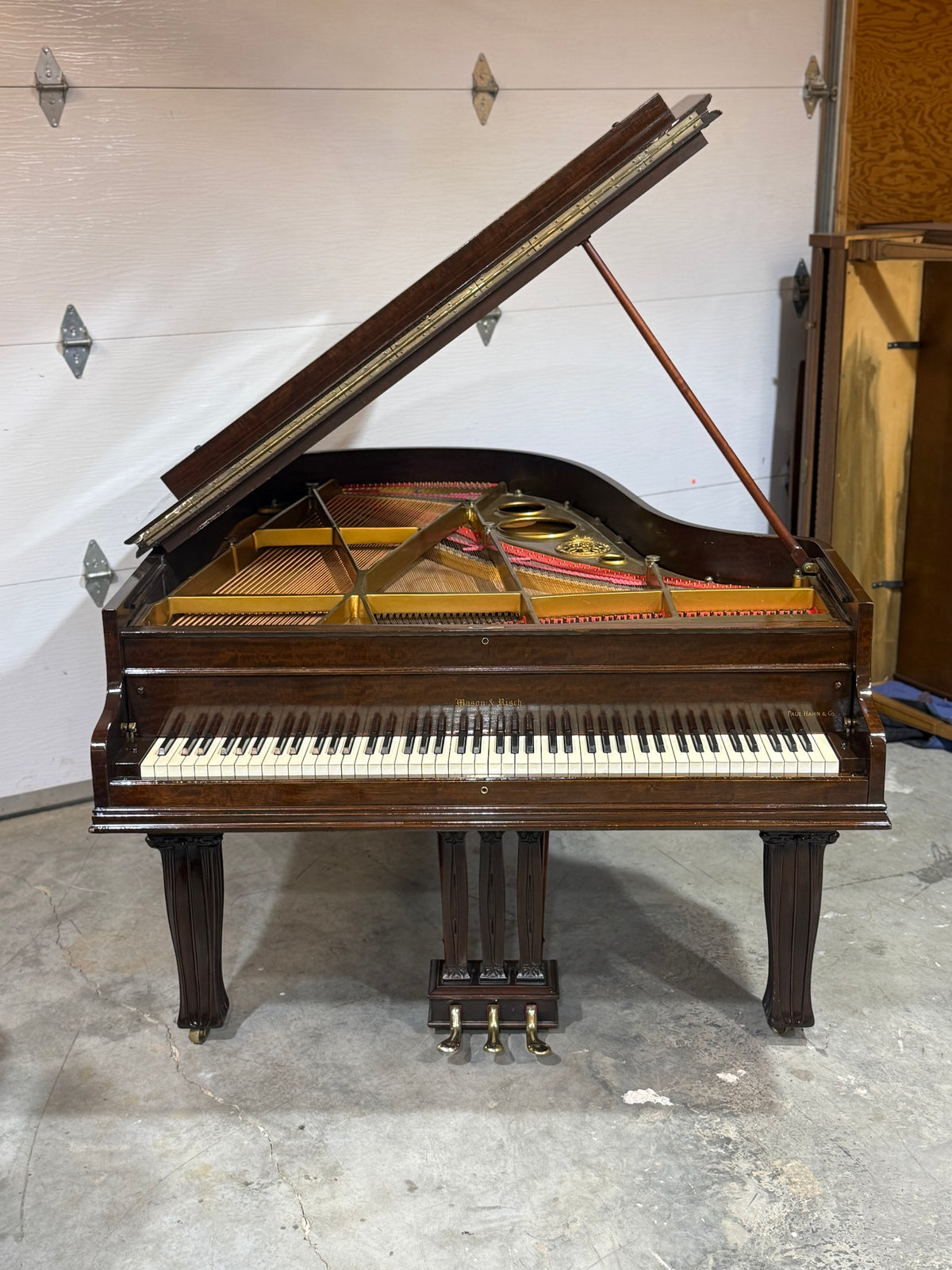 Mason & Risch grand with new strings and plate