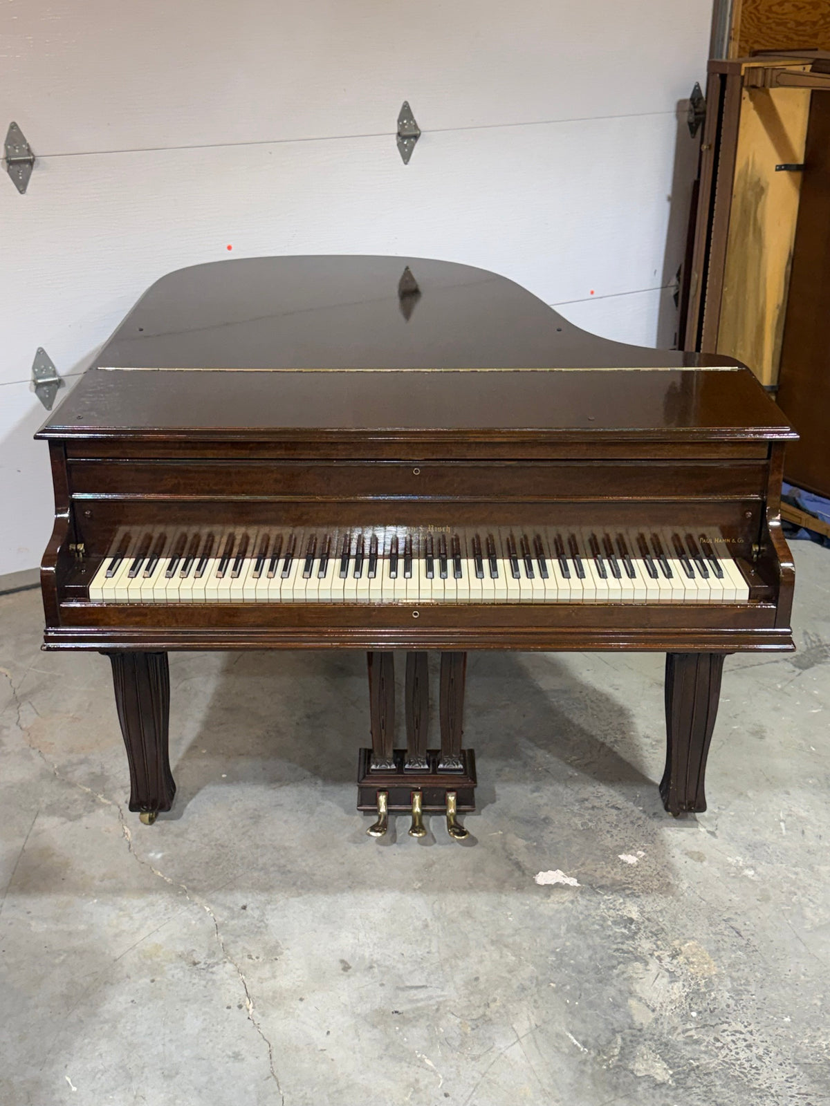 Mason & Risch grand piano front view, lid closed