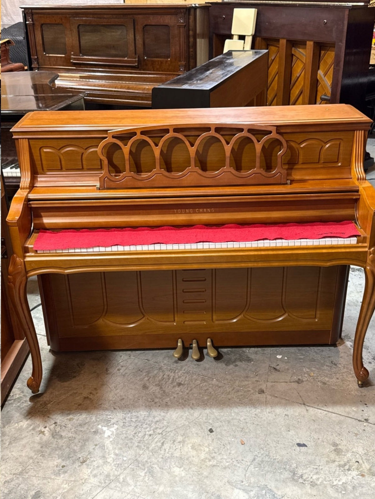 Young Chang upright piano with key cover